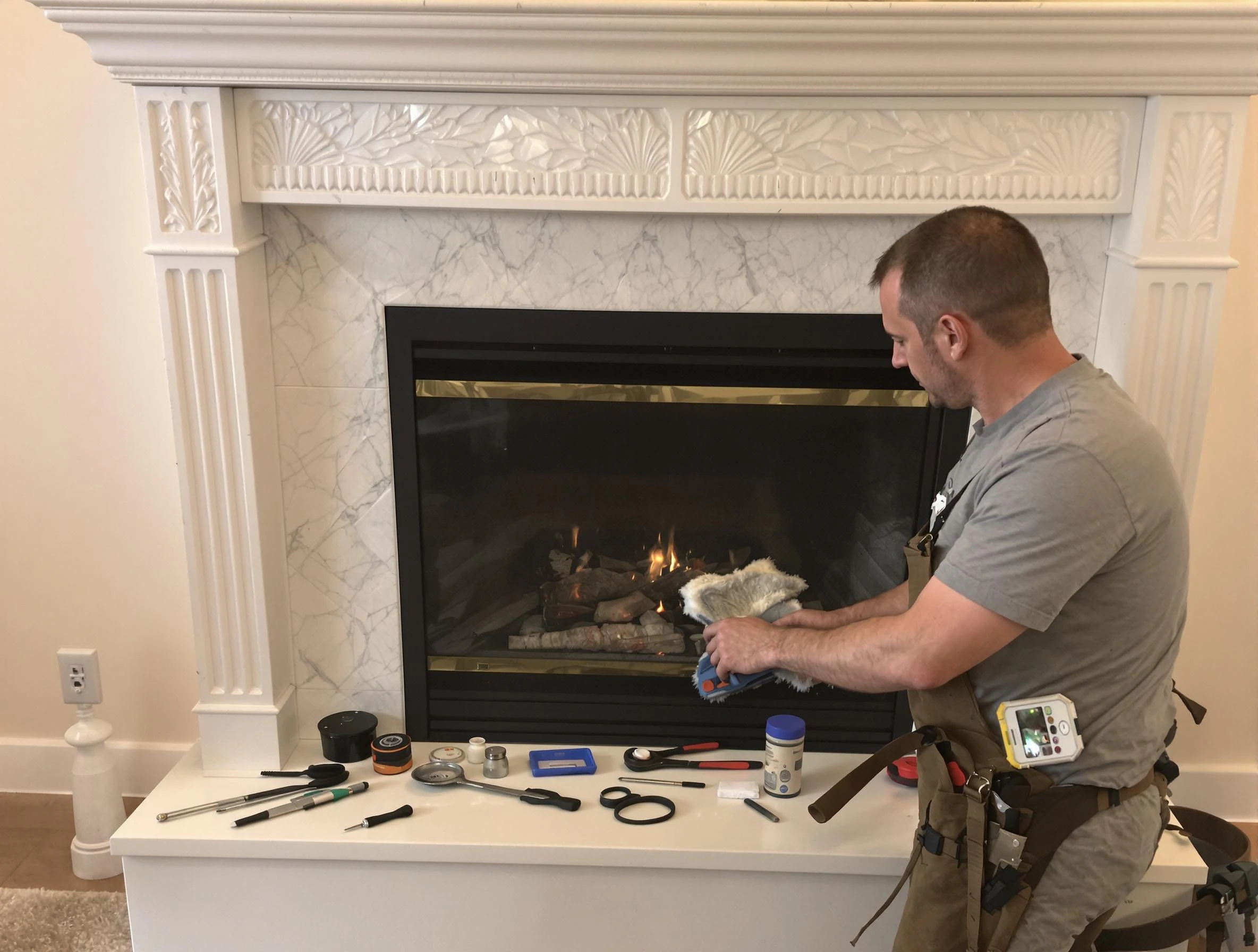 Bridgewater Chimney Sweep performing fireplace maintenance in Bridgewater, MA